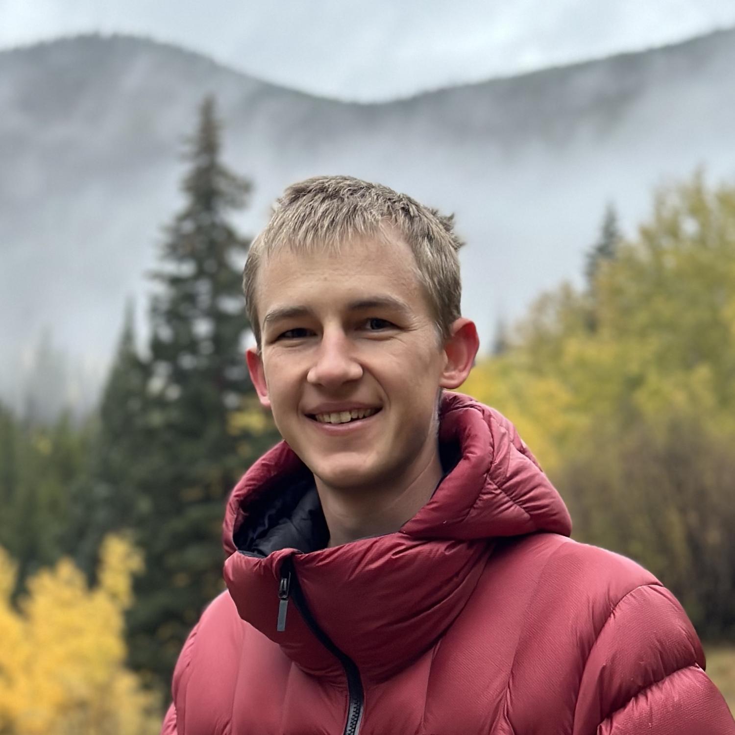Heiko Kabutz headshot with aspens changing color in the background
