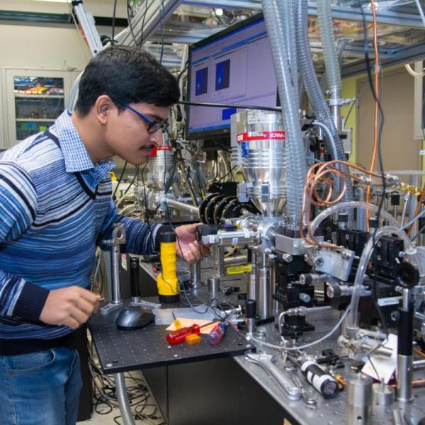 Man working in a physics lab