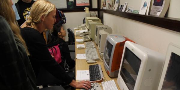 Students in front old computers