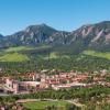 Aerial photo of CU Boulder with the Flatirons in the background