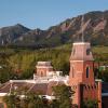 Old Main in the spring with the Flatirons in the background