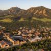 Aerial photo of CU Boulder with the Flatirons in the background