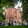 Students sitting in a circle outside of Old Main