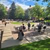 Students sitting outside of the Norlin Library