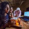 CU Boulder grad students working in a lab