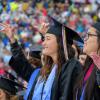 Students cheering during the 2023 commencement ceremony.