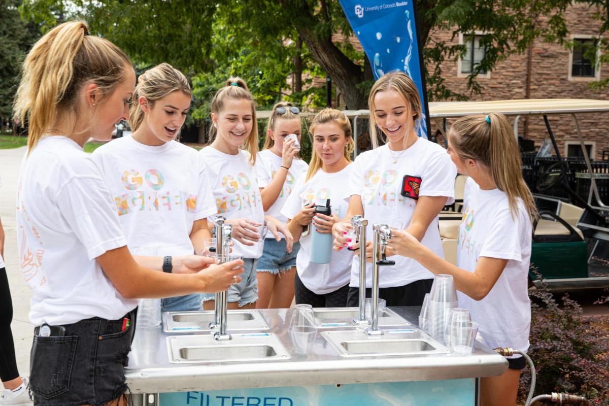 group of sorority women at water fountain