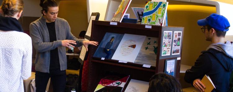 Students discuss exhibition artwork