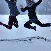 TAs jumping in snow