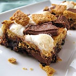 Brownie topped with toasted marshmallows, graham cracker crumbles and hershey chocolate bars.