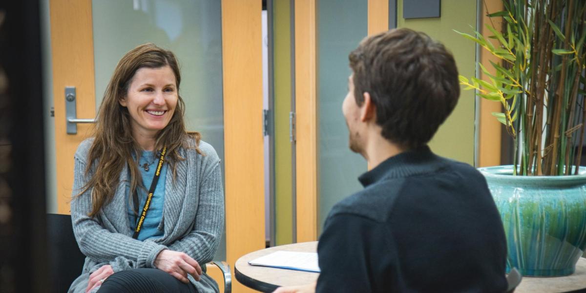 Counselor speaking to client