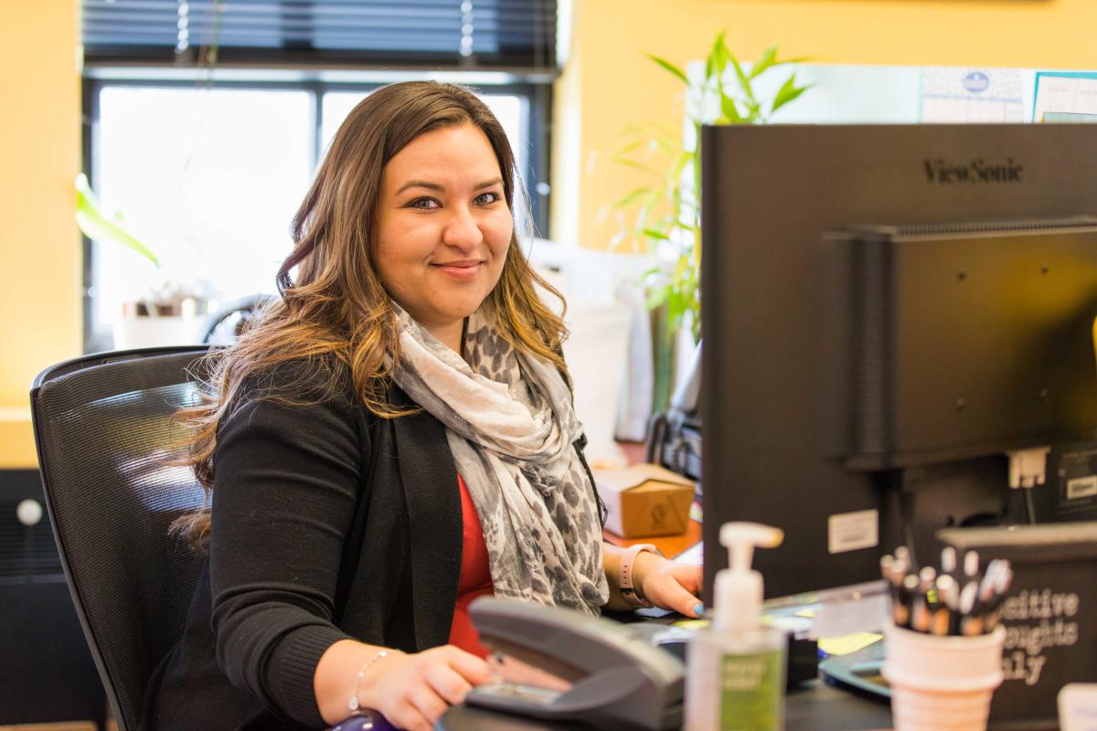CU employee at computer