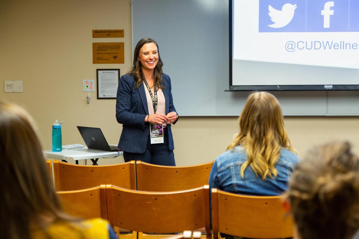 woman giving a presentation at hw summit