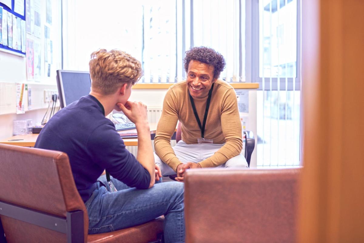 Photo of a student meeting with an advocate counselor at OVA.