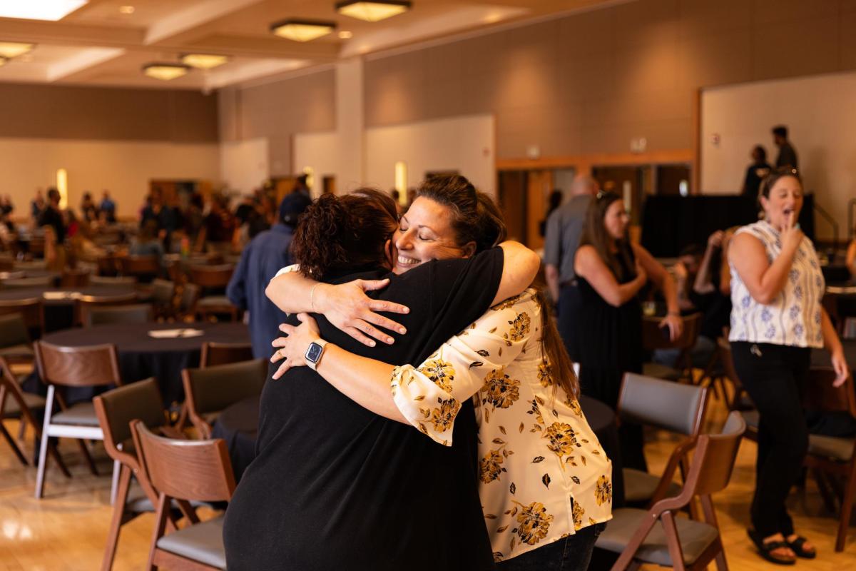 Staff hugging