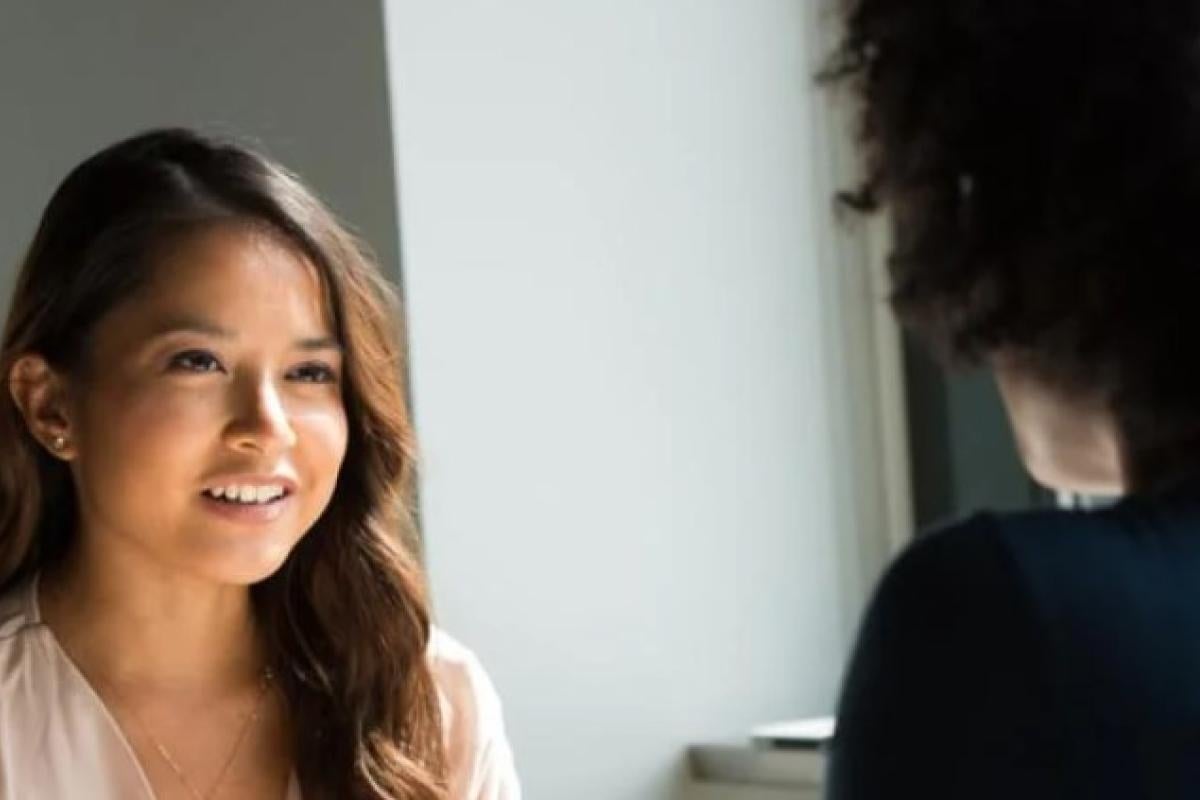 student talking to therapist