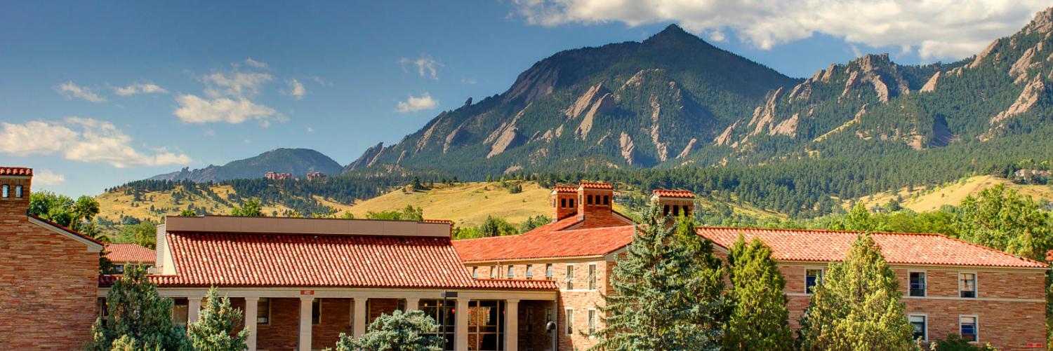 Aerial view of Cheyenne Arapahoe overlooking the Flatirons on a clear summer day.