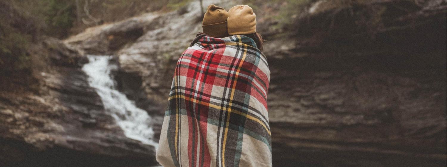 Couple under blanket