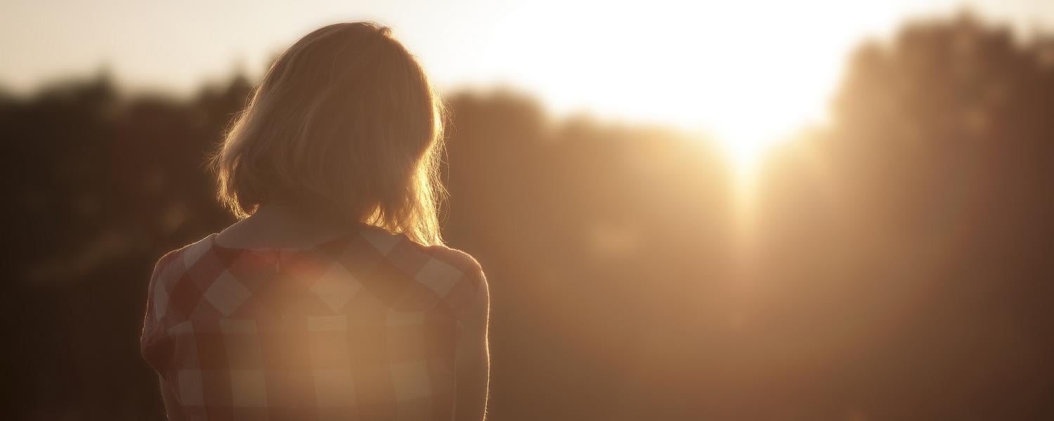Woman at sunset