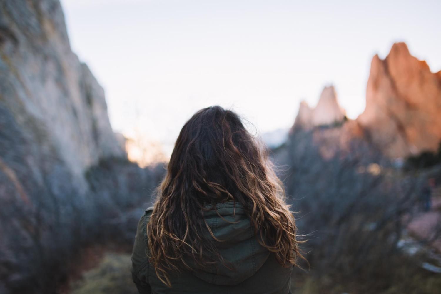 Girl looking out over mountains