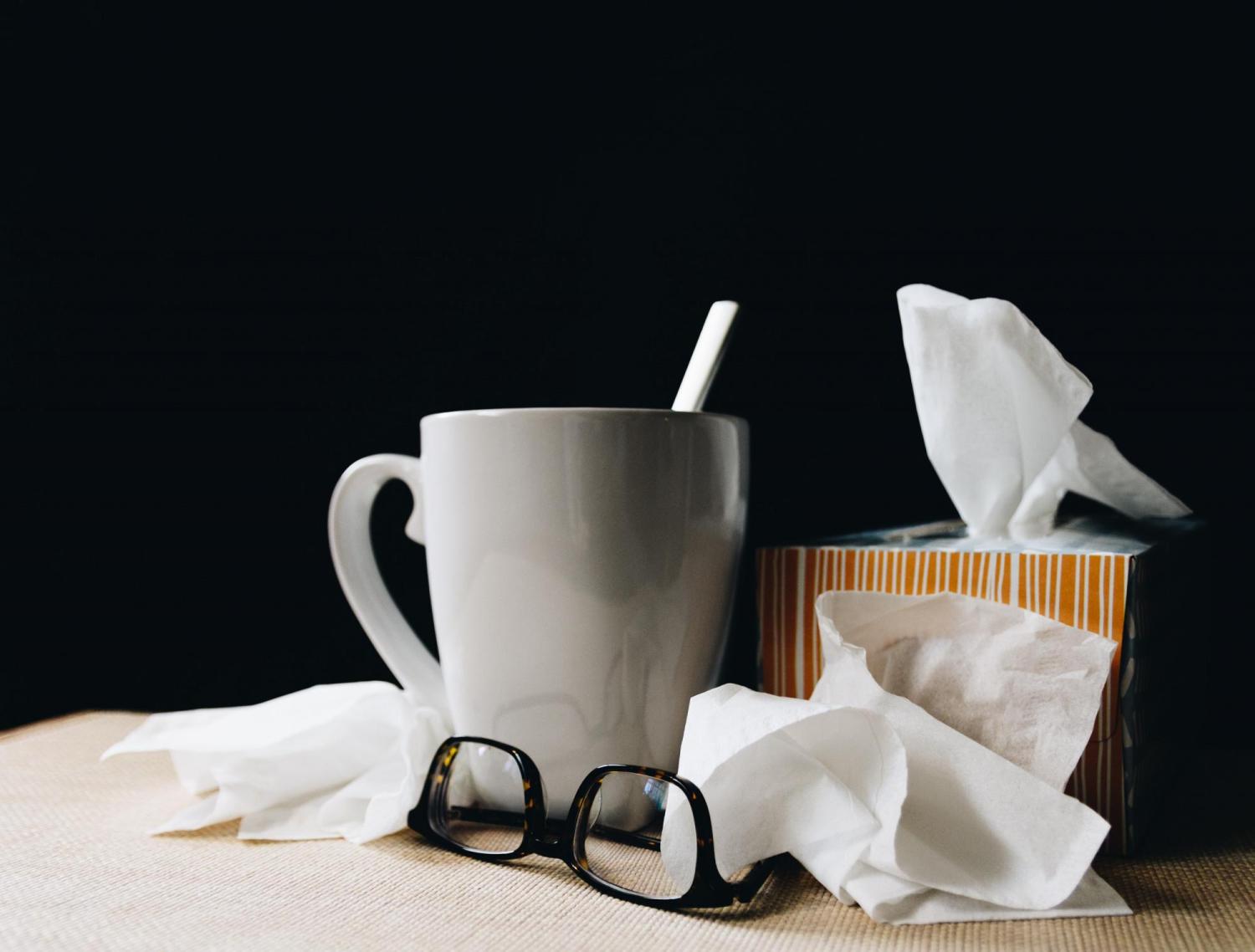 mug, tissues and glasses