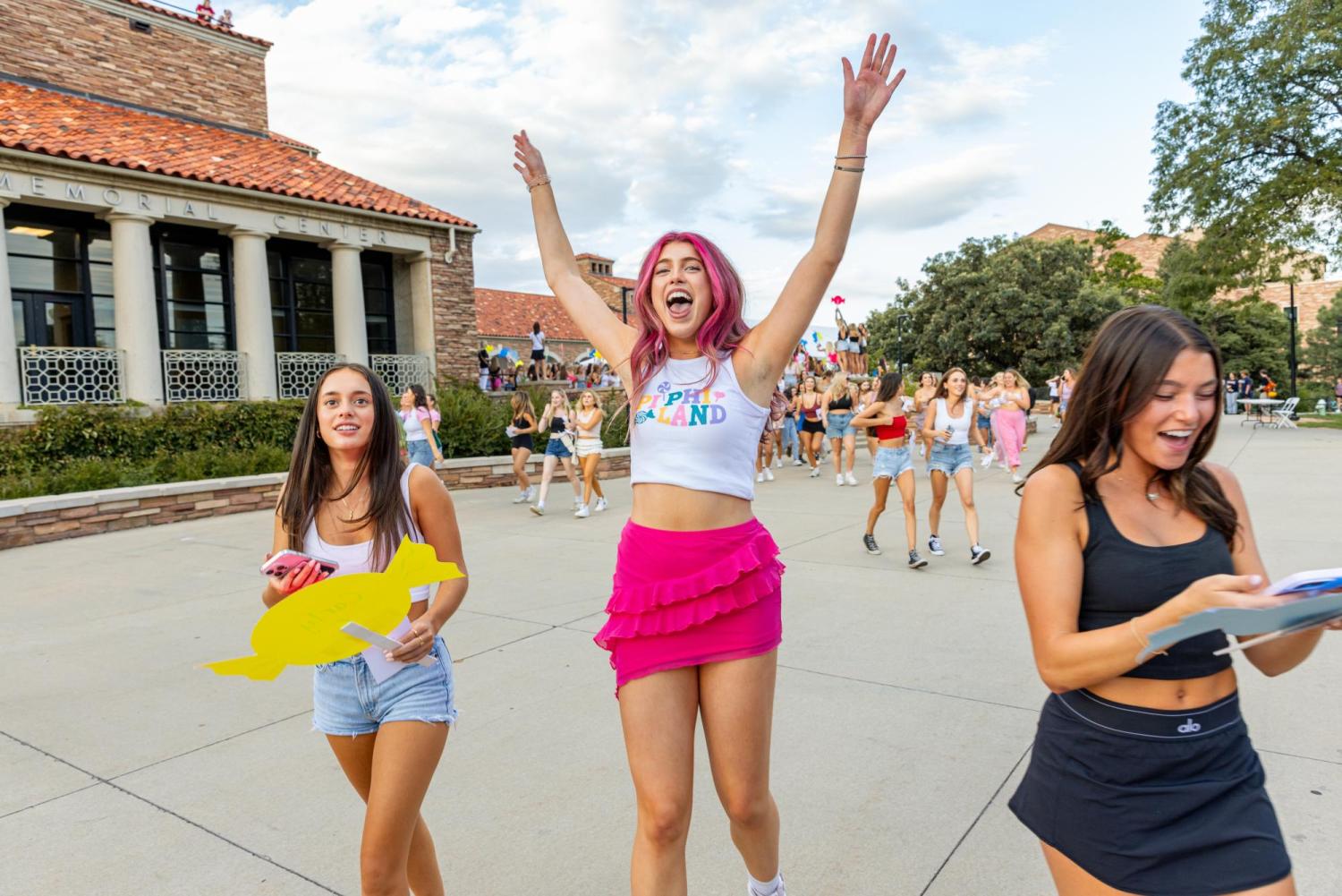 girl celebrating bid day