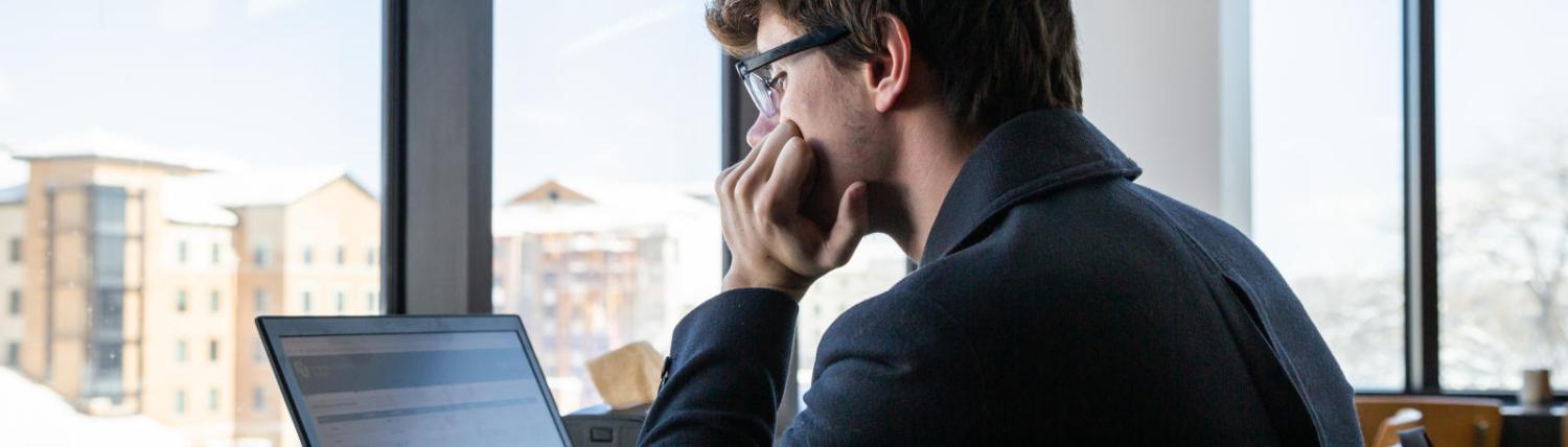 Student studying in the CASE building