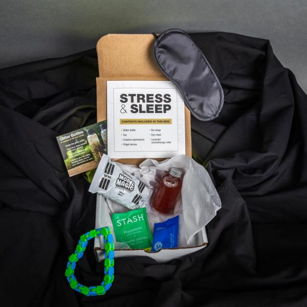Box with stress relief supplies laid out around it