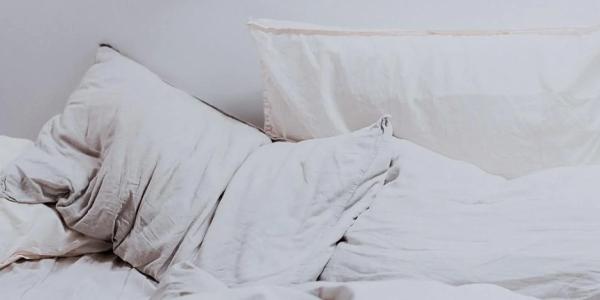 Photo of pillows on a bed