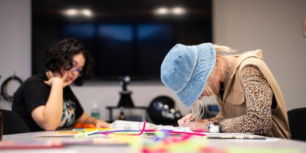 Photo of students enjoying a workshop class.