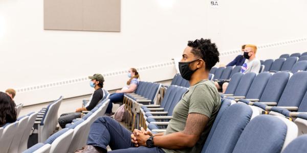 man in an audience