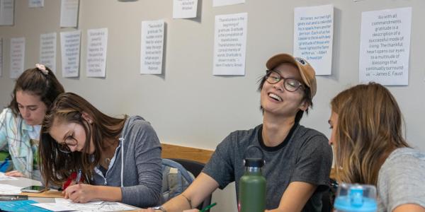 Students laughing during a wellness workshop.