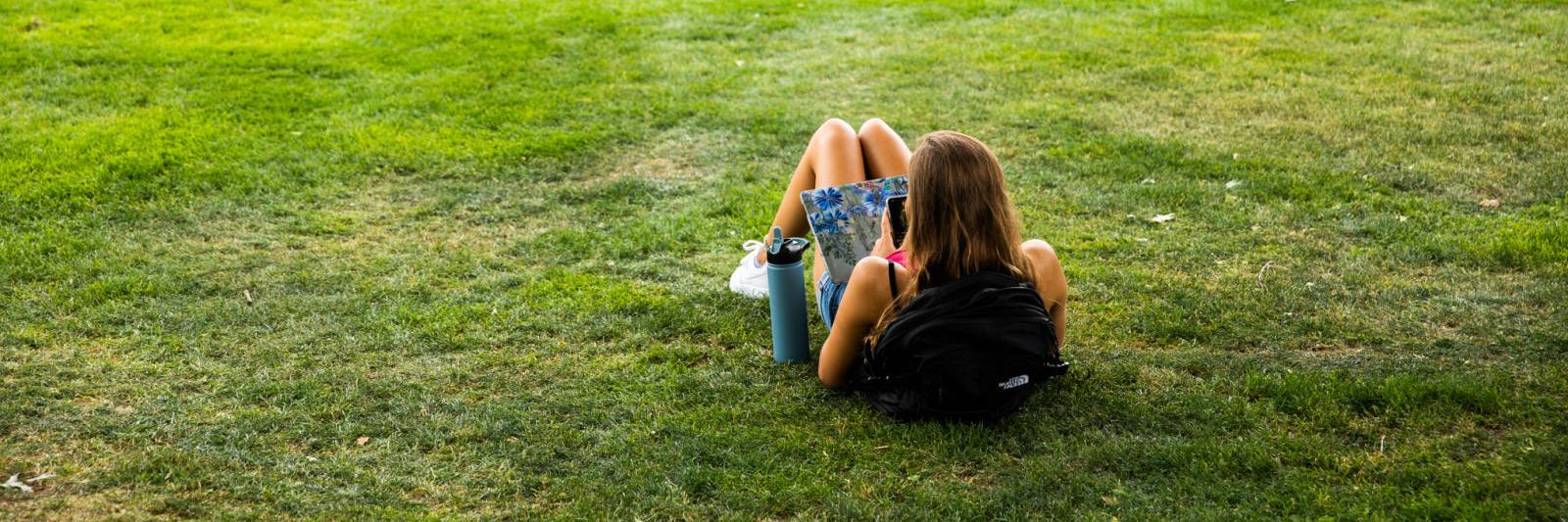 student on grass