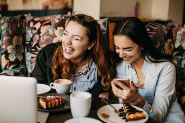 two women laughing