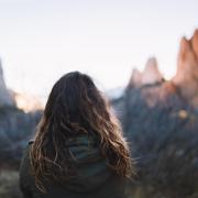 Girl looking out over mountains