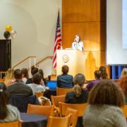 Photo of staff and faculty attending a large presentation at the UMC as part of the Health and Wellness Summit.