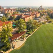 Panoramic aerial photo overlooking Farrand Field and the surrounding buildings on campus.