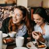 two women laughing