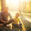 dad and child talking outside