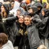 two students at football game