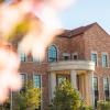 Photo of a flowering tree in front of the Business building.