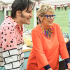 Photo of Paul and Prue tasting a competitor's dish on the Great British Baking Show.