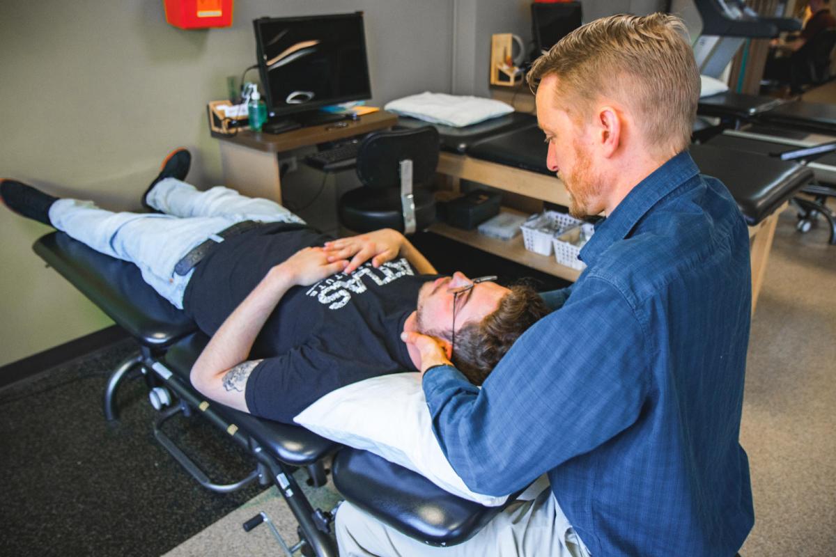 doctor assessing patient
