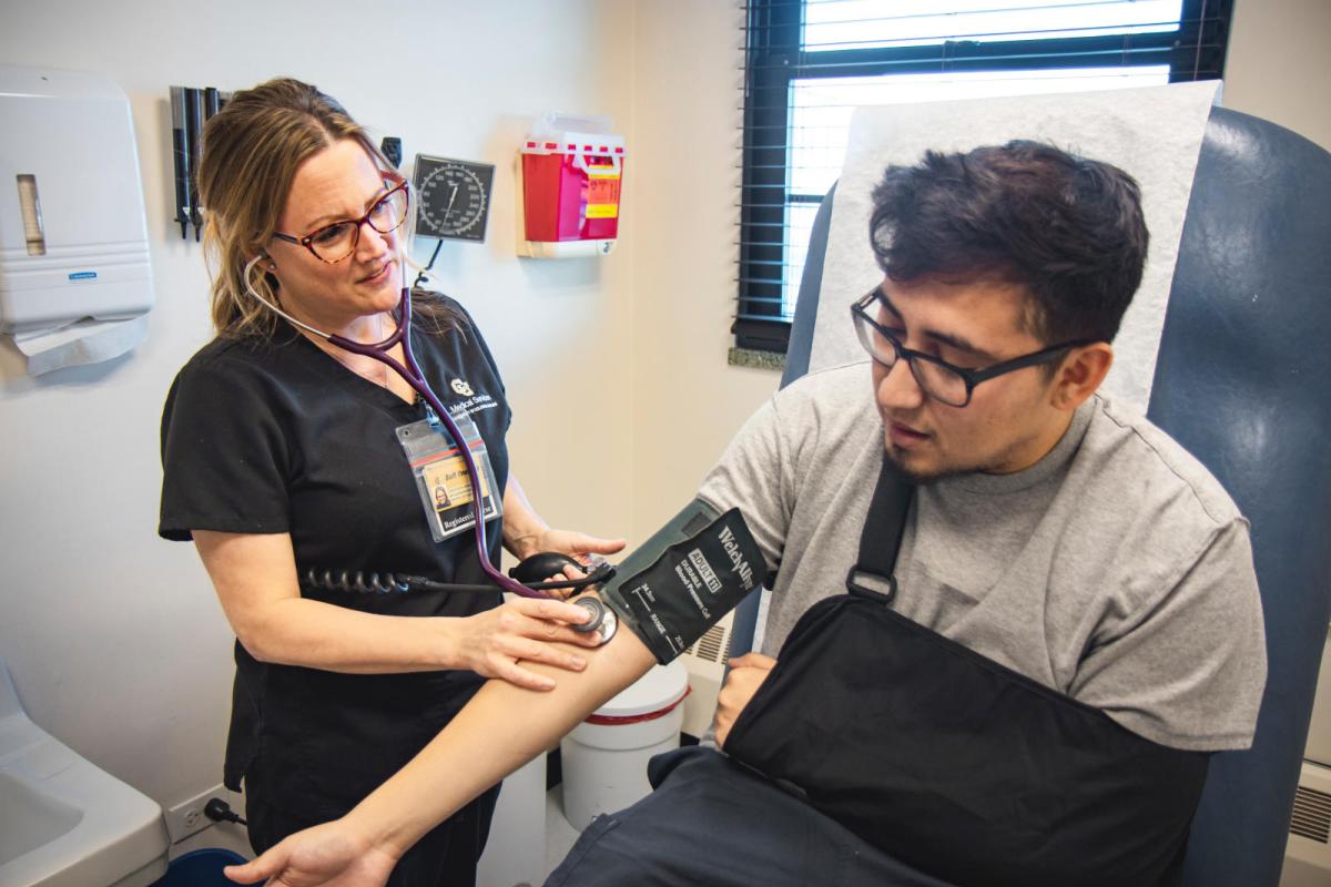 doctor taking blood pressure