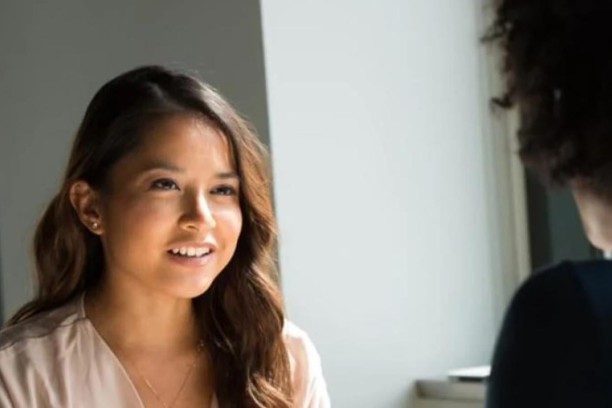 student talking to therapist