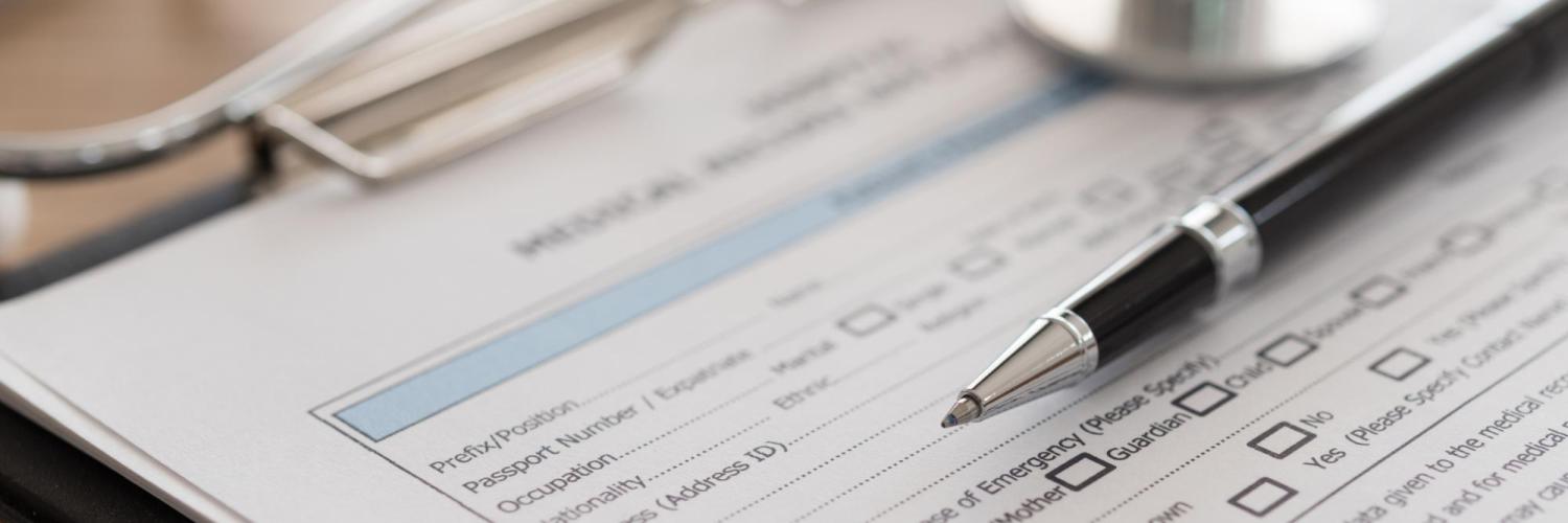 Medical release forms on clipboard