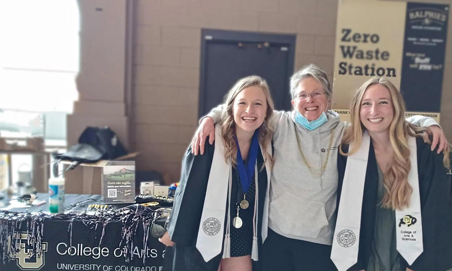 Graduation 2021 photo of Maddie W and Perry H with Stephanie Barnhizer