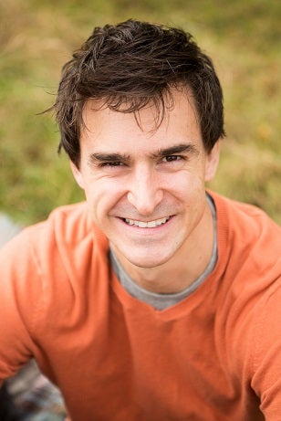 Professor Lewis Dartnell in orange shirt