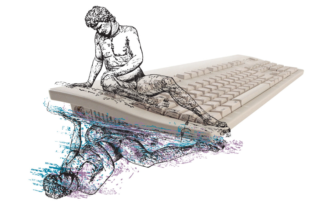 A man looks at his reflection over a keyboard