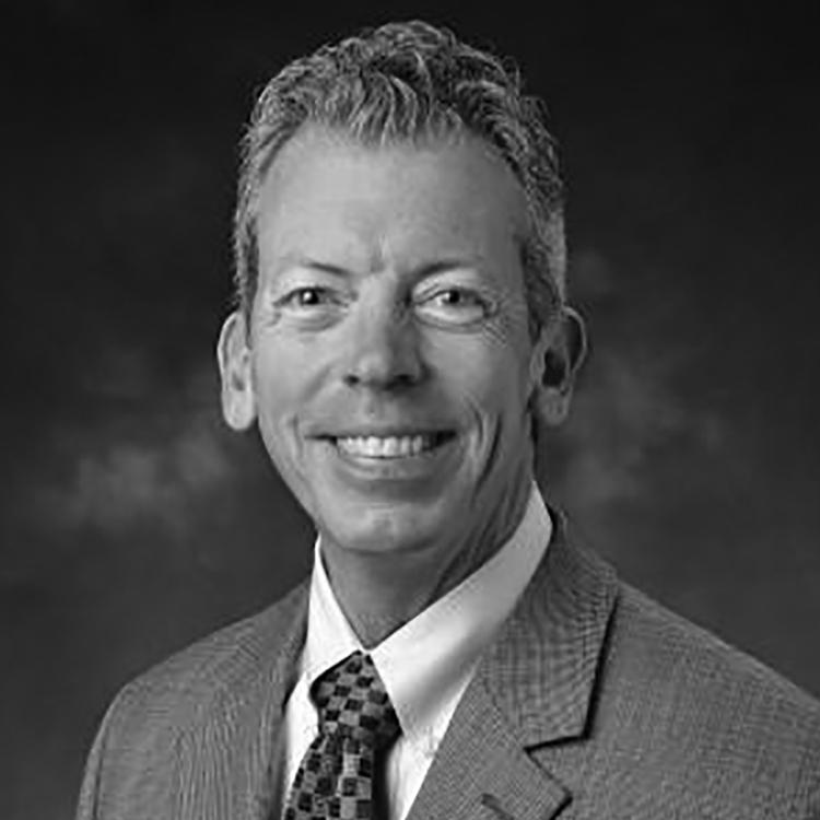 Coleman headshot, black and white